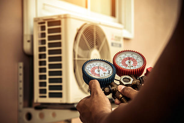Professional Hvac technician working in Mc Clellandtown, PA